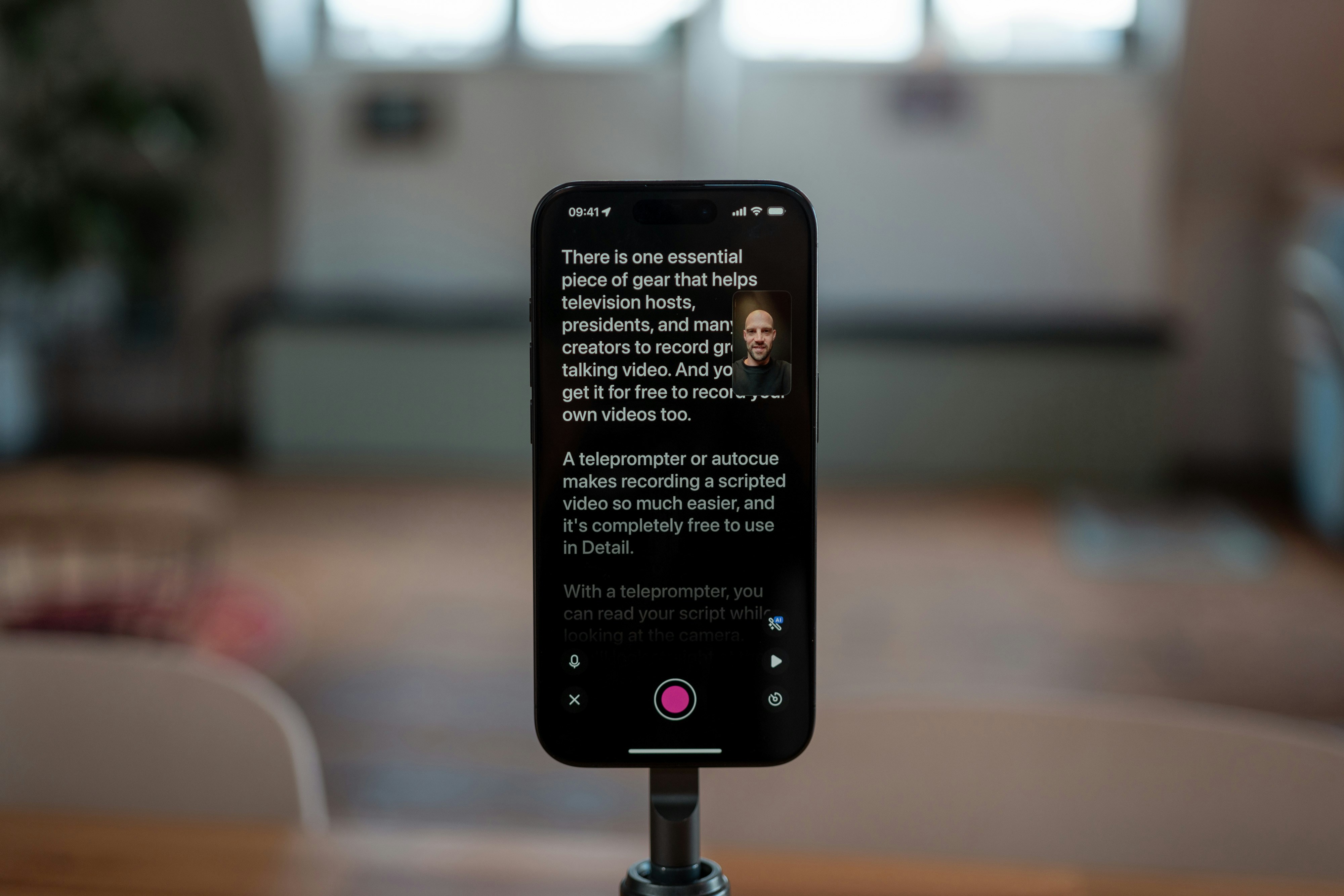 Smartphone displaying text with a person's profile.